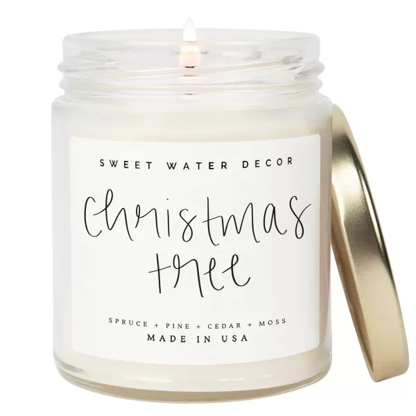 imageSweet Water Decor Christmas Tree Candle  Pine Needles Cedarwood Cypress and Evergreen Soy Holiday Scented Candles for Home  9oz Clear Jar Candle 40 Hour Burn Time Made in the USAChristmas Tree