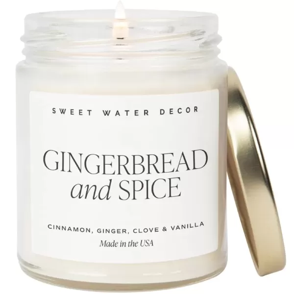 imageSweet Water Decor Christmas Tree Candle  Pine Needles Cedarwood Cypress and Evergreen Soy Holiday Scented Candles for Home  9oz Clear Jar Candle 40 Hour Burn Time Made in the USAGingerbread and Spice