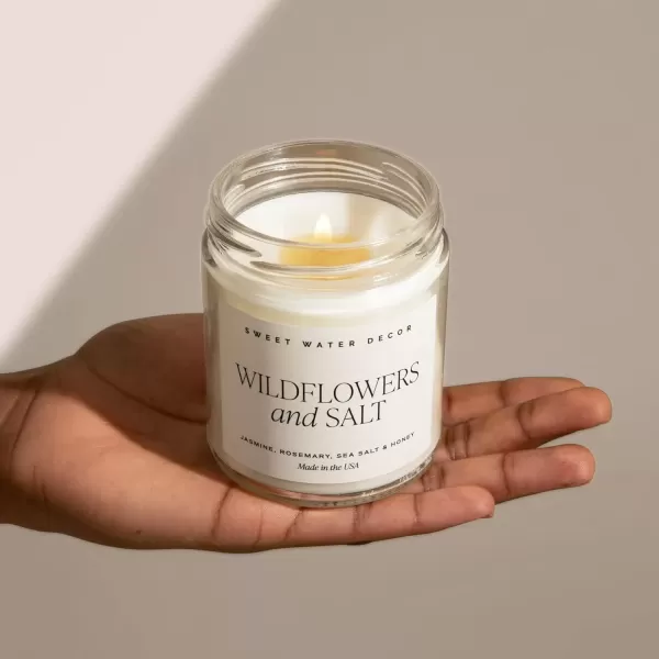 imageSweet Water Decor Christmas Tree Candle  Pine Needles Cedarwood Cypress and Evergreen Soy Holiday Scented Candles for Home  9oz Clear Jar Candle 40 Hour Burn Time Made in the USAWildflowers and Salt