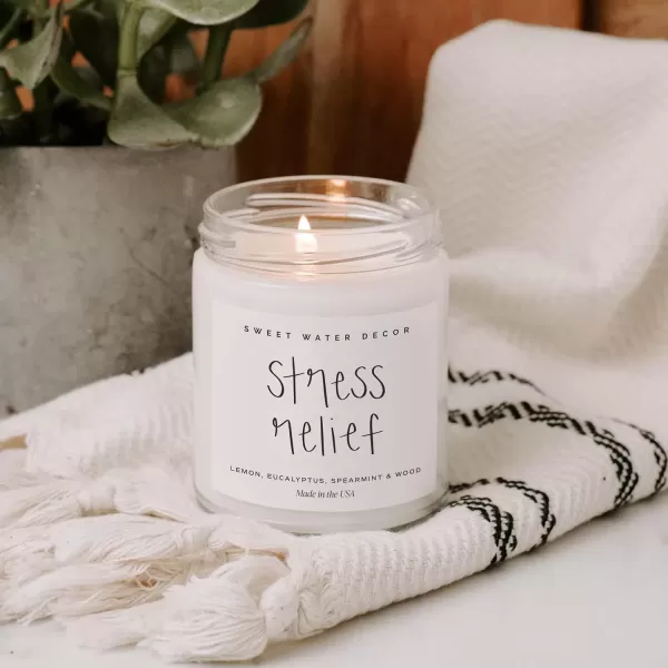 imageSweet Water Decor Christmas Tree Candle  Pine Needles Cedarwood Cypress and Evergreen Soy Holiday Scented Candles for Home  9oz Clear Jar Candle 40 Hour Burn Time Made in the USAStress Relief
