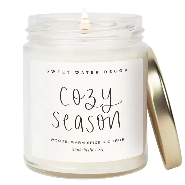 imageSweet Water Decor Cozy Season Candle  Woods Warm Spice and Citrus Autumn Scented Soy Candles for Home  9oz Clear Jar 40 Hour Burn Time Made in the USACozy Season