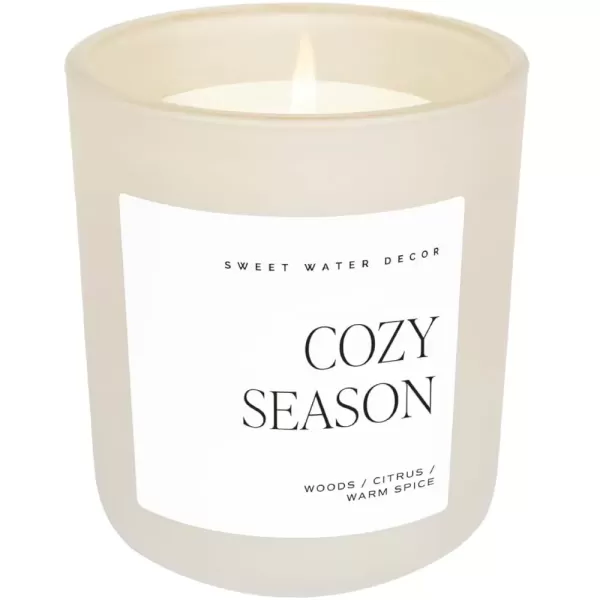 imageSweet Water Decor Cozy Season Soy Candle  Woods Warm Spice and Citrus Scented Candle for Home  15oz Tan Matte Jar 70 Hour Burn Time Made in the USA  Winter Candles for HomeTan