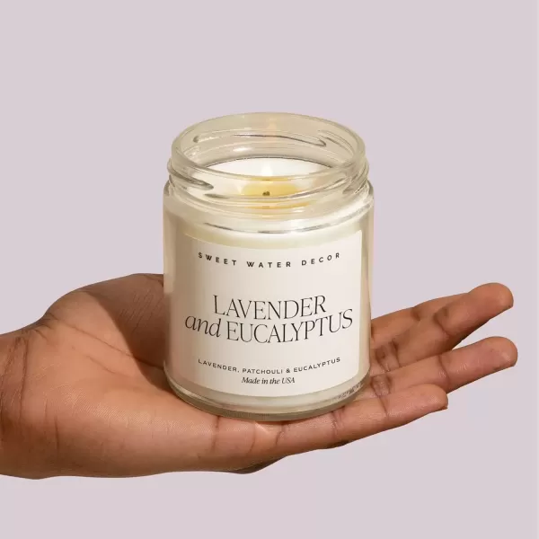 imageSweet Water Decor Driftwood and Mahogany Soy Candle  Warm Mahogany Fresh Lavender Geranium and Teakwood Scented Candles for Home  9oz Clear Jar  Gold Lid 40 Hour Burn Time Made in the USALavender and Eucalyptus