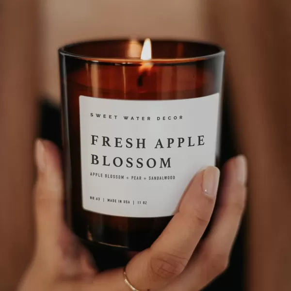imageSweet Water Decor Farmhouse Candle  Autumn Cinnamon and Nutmeg Fall Scented Soy Candles for Home  11oz White Glass  Wood Lid 50 Hour Burn Time Made in the USAAmber
