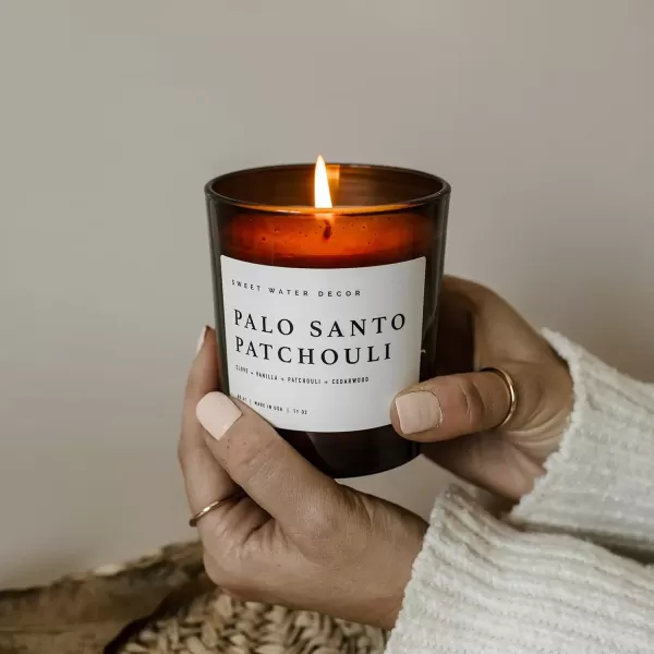 imageSweet Water Decor Farmhouse Candle  Autumn Cinnamon and Nutmeg Fall Scented Soy Candles for Home  11oz White Glass  Wood Lid 50 Hour Burn Time Made in the USAAmber