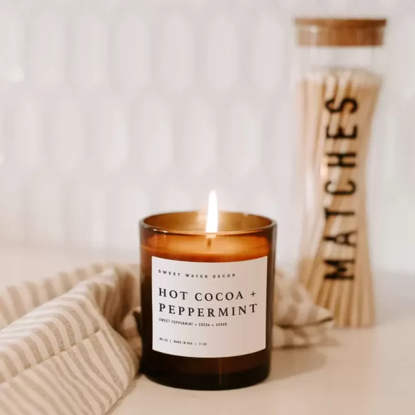 imageSweet Water Decor Farmhouse Candle  Autumn Cinnamon and Nutmeg Fall Scented Soy Candles for Home  11oz White Glass  Wood Lid 50 Hour Burn Time Made in the USAAmber