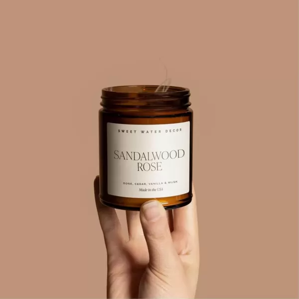 imageSweet Water Decor Island Air Soy Candle  Tropical Fruit Mountain Air and Orange Scented Summer Candles for Home  9oz Amber Jar  Black Lid 40 Hour Burn Time Made in the USASandalwood Rose