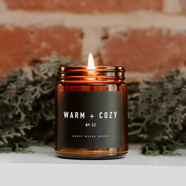 imageSweet Water Decor Palo Santo Patchouli Candle  Vanilla Musk Sandalwood Patchouli Scented Soy Candles for Home  Gifts for Women Men Housewarming  9oz Amber Jar 40 Hour Burn TimeWarm  Cozy
