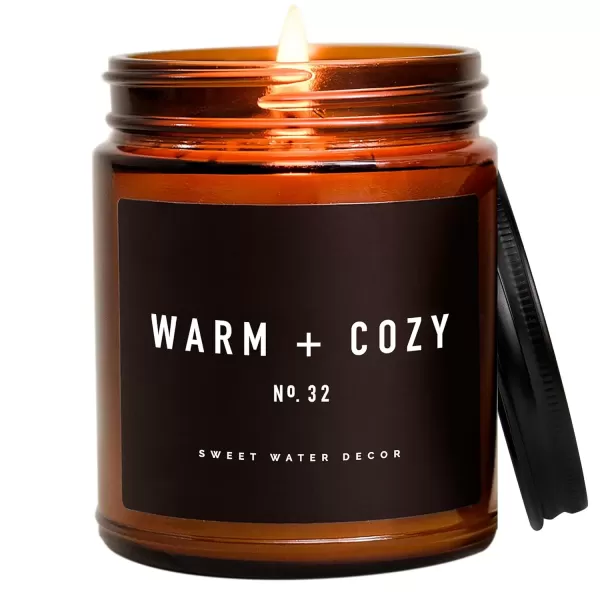 imageSweet Water Decor Palo Santo Patchouli Candle  Vanilla Musk Sandalwood Patchouli Scented Soy Candles for Home  Gifts for Women Men Housewarming  9oz Amber Jar 40 Hour Burn TimeWarm  Cozy