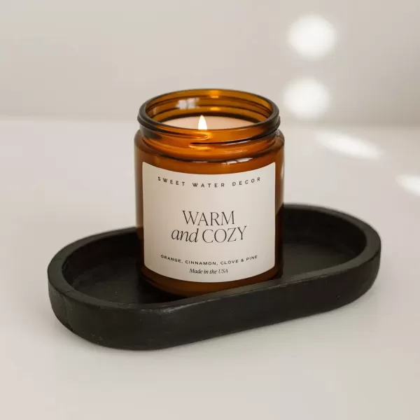 imageSweet Water Decor Palo Santo Patchouli Candle  Vanilla Musk Sandalwood Patchouli Scented Soy Candles for Home  Gifts for Women Men Housewarming  9oz Amber Jar 40 Hour Burn TimeWarm  Cozy