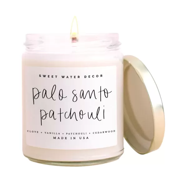 imageSweet Water Decor Relaxation Soy Candle  Eucalyptus Peppermint and Clove Scented Candles for Home  9oz Clear Jar  Gold Lid 40 Hour Burn Time Made in the USAPalo Santo Patchouli