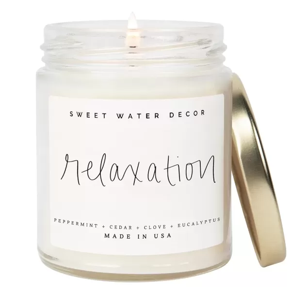 imageSweet Water Decor Relaxation Soy Candle  Eucalyptus Peppermint and Clove Scented Candles for Home  9oz Clear Jar  Gold Lid 40 Hour Burn Time Made in the USARelaxation