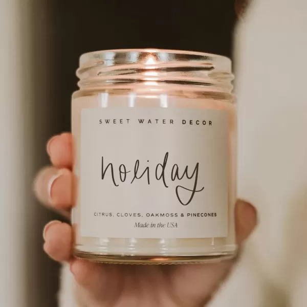 imageSweet Water Decor Spa Day Soy Candle  Sea Salt Jasmine Wood and Cream Scented Candles for Home  9oz Clear Jar  Gold Lid 40 Hour Burn Time Made in the USAHoliday
