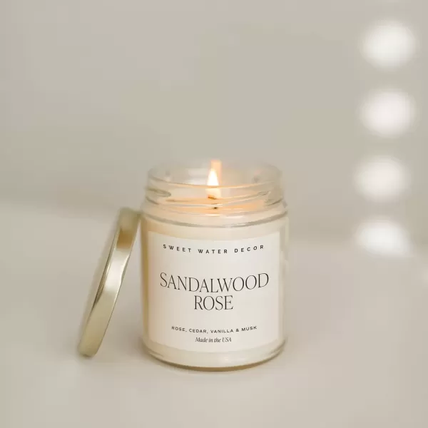 imageSweet Water Decor Spa Day Soy Candle  Sea Salt Jasmine Wood and Cream Scented Candles for Home  9oz Clear Jar  Gold Lid 40 Hour Burn Time Made in the USASandalwood Rose