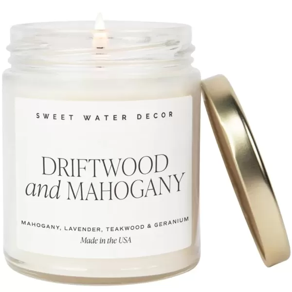 imageSweet Water Decor Spa Day Soy Candle  Sea Salt Jasmine Wood and Cream Scented Candles for Home  9oz Clear Jar  Gold Lid 40 Hour Burn Time Made in the USADriftwood and Mahogany