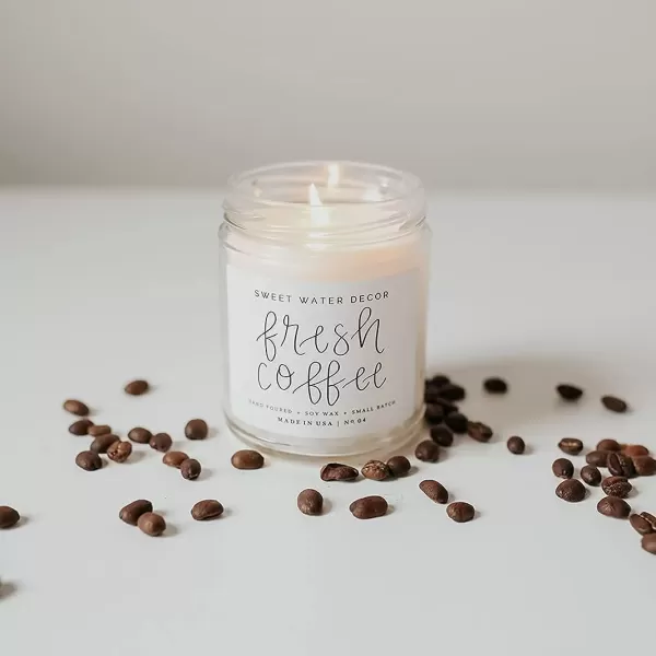 imageSweet Water Decor Spa Day Soy Candle  Sea Salt Jasmine Wood and Cream Scented Candles for Home  9oz Clear Jar  Gold Lid 40 Hour Burn Time Made in the USAFresh Coffee