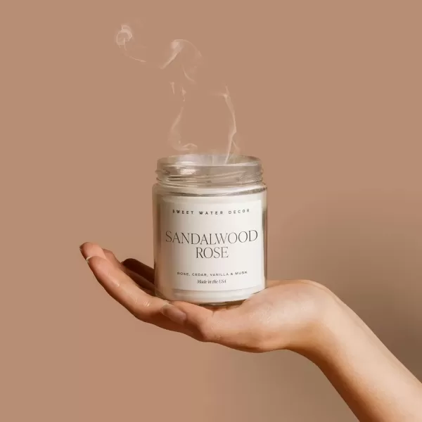 imageSweet Water Decor Spa Day Soy Candle  Sea Salt Jasmine Wood and Cream Scented Candles for Home  9oz Clear Jar  Gold Lid 40 Hour Burn Time Made in the USASandalwood Rose