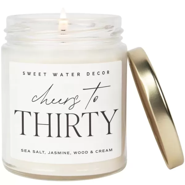 imageSweet Water Decor Cheers to Forty Candle  Sea Salt Jasmine Wood and Cream Scented Candle for Home  9oz Clear Jar with 40 Hour Burn Time Made in USA  40th Anniversary and Birthday GiftsCheers to Thirty