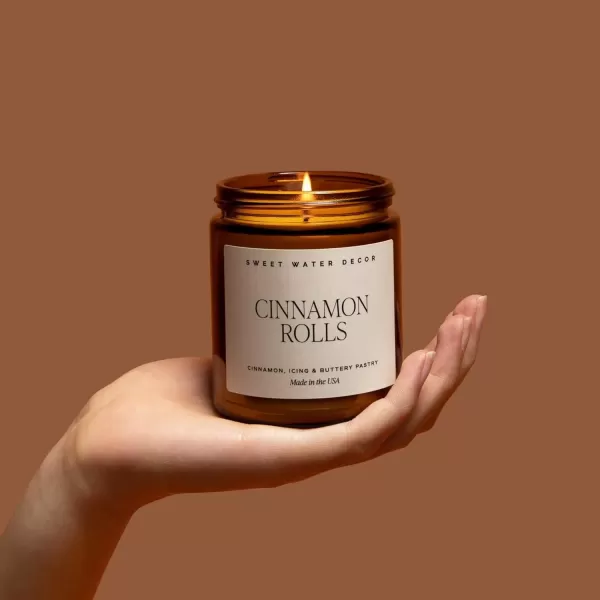 imageSweet Water Decor Cinnamon Roll Candle  Fall Candle with Cinnamon Icing and Cinnamon Buttery Pastry for Home  Cinnamon Soy Candle with 40 Hours Burn Time  9Oz Black Lid Amber Jar Cinnamon ScentsCinnamon Rolls