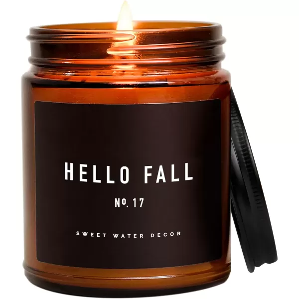 imageSweet Water Decor Hello Fall Candle No 17  Cider Cinnamon Cloves Apple and Nutmeg Scented Soy Wax Candle for Home  9oz Amber Jar with Black Lid 40 Hour Burn Time Made in The USA Hello FallHello Fall