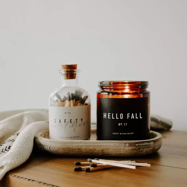 imageSweet Water Decor Hello Fall Candle No 17  Cider Cinnamon Cloves Apple and Nutmeg Scented Soy Wax Candle for Home  9oz Amber Jar with Black Lid 40 Hour Burn Time Made in The USA Hello FallHello Fall