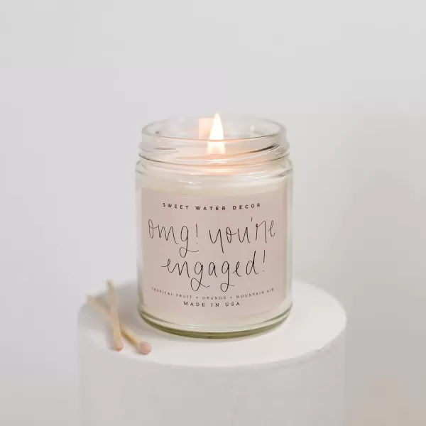 imageSweet Water Decor Relax Girl Peppermint Cedar Clove and Eucalyptus Scented Soy Wax Candle for Home  9oz Clear Jar 40 Hour Burn Time Made in the USAOMG Youre Engaged