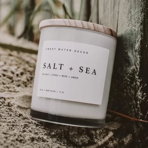 imageSweet Water Decor Salt and Sea Candle  Sea Salt Citrus Amber Musk Beach Scented Soy Candles for Home  11oz White Glass Jar  Wood Lid 50 Hour Burn Time Made in the USAWhite