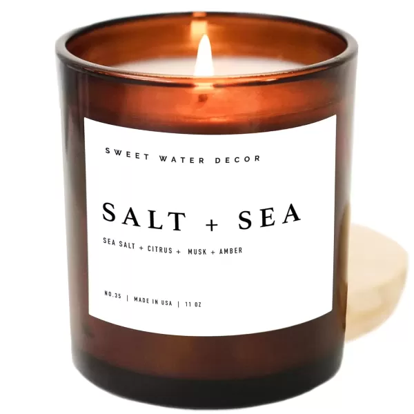 imageSweet Water Decor Salt and Sea Candle  Sea Salt Citrus Amber Musk Beach Scented Soy Candles for Home  11oz White Glass Jar  Wood Lid 50 Hour Burn Time Made in the USAAmber