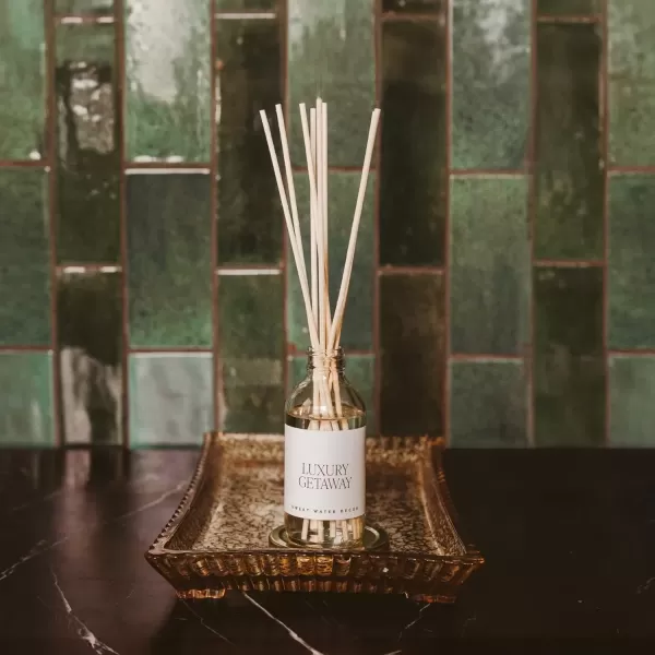 imageSweet Water Decor Spa Reed Diffuser Set  Sea Salt Wood and Cream Scented Reed Diffuser for Home  Home Freshener Diffuser with Sticks  Long Lasting Fragrance Made in the USALuxury Getaway