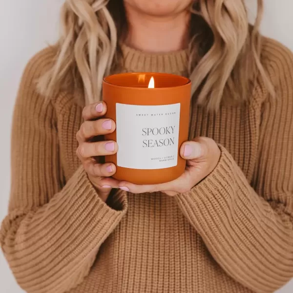 imageSweet Water Decor Spooky Season Orange Scented Candle  Halloween Candles with Woods Warm Spice ampamp Citrus Scent  100 Cotton Wick Decorative Candles with 40 Hour Burn Time  15oz Orange Jar CandleOrange