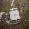 imageSweet Water Decor Christmas Scented Candle  Cinnamon Trees Orange and Clove Scented Winter Candle  Christmas Candles and Decor for Home  9oz Clear Jar Soy Candle Made in the USASalt and Sea