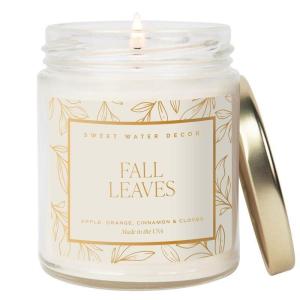 imageSweet Water Decor Trick or Treat Candle Autumn Scented Notes of Pumpkin Spices ampamp Caramel 40 Hour Burn Time NonToxic Soy Wax Blend Poured in the USA Cotton Wick 9oz Glass Jar with Gold LidFall Leaves