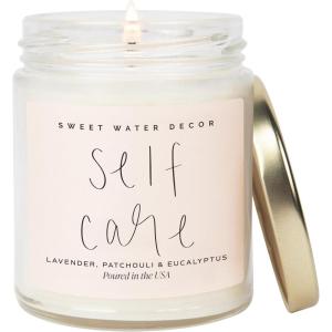 image:imageSweet Water Decor Be Still and Know Candle Sea Salt Jasmine Cream and Wood Scented Soy Wax Candle for Home Christian Gift for Women 9oz Clear Jar 40 Hour Burn Time Made in the USASelf Care