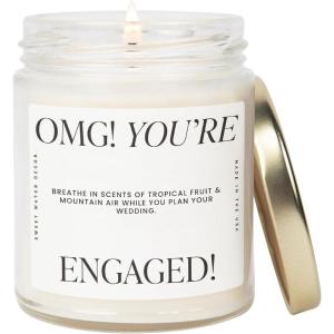 image:imageSweet Water Decor Something Blue Candle NonToxic Soy Wax with Lemon Cedarwood Cinnamon Vetiver Amber amp Musk 15 oz Jar 70 Hours Burn Time  Bridal Shower Decoration and Gift for Future WifeOMG Youre Engaged  Large Text