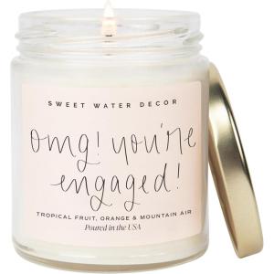 image:imageSweet Water Decor Something Blue Candle NonToxic Soy Wax with Lemon Cedarwood Cinnamon Vetiver Amber amp Musk 15 oz Jar 70 Hours Burn Time  Bridal Shower Decoration and Gift for Future WifeOMG  Youre Engaged