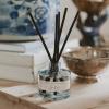 image:imageSweet Water Decor Salt and Sea Reed Diffuser Set Blue Tinted Glass Jar Sea Salt Citrus and Musk Amber Scent Long Lasting Fragrance Non Toxic Oil Reed Diffuser for Home amp Office Poured in the USASpa Day