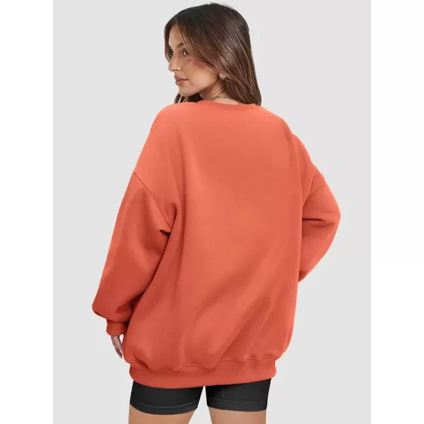 imageATHMILE Oversized Sweatshirt for Women Crewneck Fleece Long Sleeve Pullover Hoodies Tops Fall Fashion Outfits Clothes 2024Orange Red
