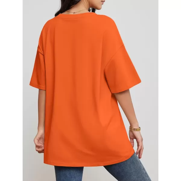 imageATHMILE Womens Oversized T Shirts V Neck Tees Half Sleeve Cozy Comfy Tunic 2024 Y2K Tops CasualOrange
