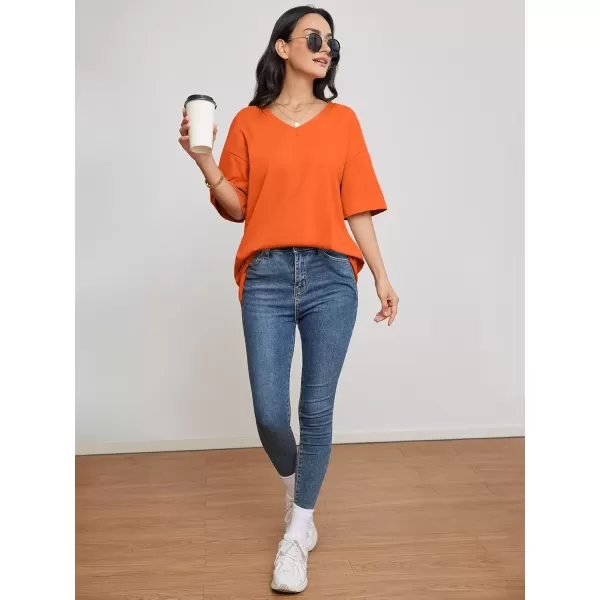 imageATHMILE Womens Oversized T Shirts V Neck Tees Half Sleeve Cozy Comfy Tunic 2024 Y2K Tops CasualOrange