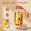 imageSMIRLY 64 oz Mason Jar PitcherGlass Pitcher with Wide MouthWater Jug with Double Leak Proof Lid for Iced CoffeeHot WaterBreast MilkOrange