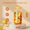 imageSMIRLY 64 oz Mason Jar PitcherGlass Pitcher with Wide MouthWater Jug with Double Leak Proof Lid for Iced CoffeeHot WaterBreast MilkYellow