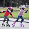 imageSowume Adjustable Roller Skates for Girls and Women All 8 Wheels of Girls Skates Shine Safe and Fun Illuminating for KidsEGreen