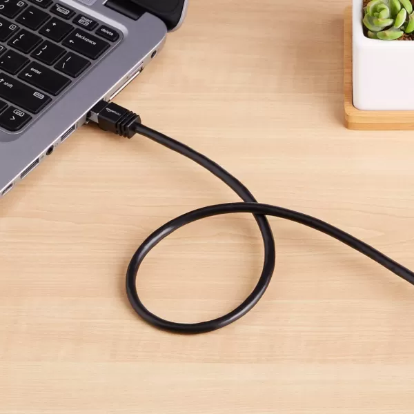 Amazon Basics RJ45 Cat 7 Ethernet Patch Cable 10Gpbs HighSpeed Cable 600MHz DoubleShielded 5 Foot WhiteBlack