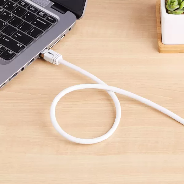 Amazon Basics RJ45 Cat 7 Ethernet Patch Cable 10Gpbs HighSpeed Cable 600MHz DoubleShielded 5 Foot WhiteWhite