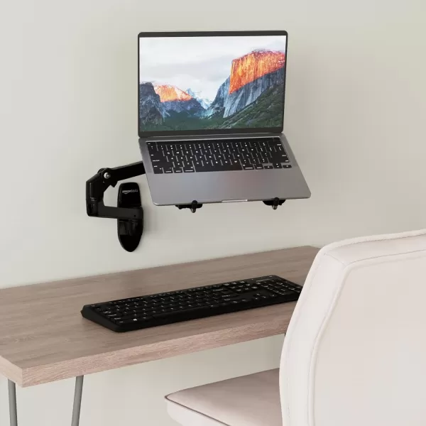 Amazon Basics Wall Mount Computer Monitor and TV Stand  Lift Engine Arm Mount Aluminum  BlackBlack