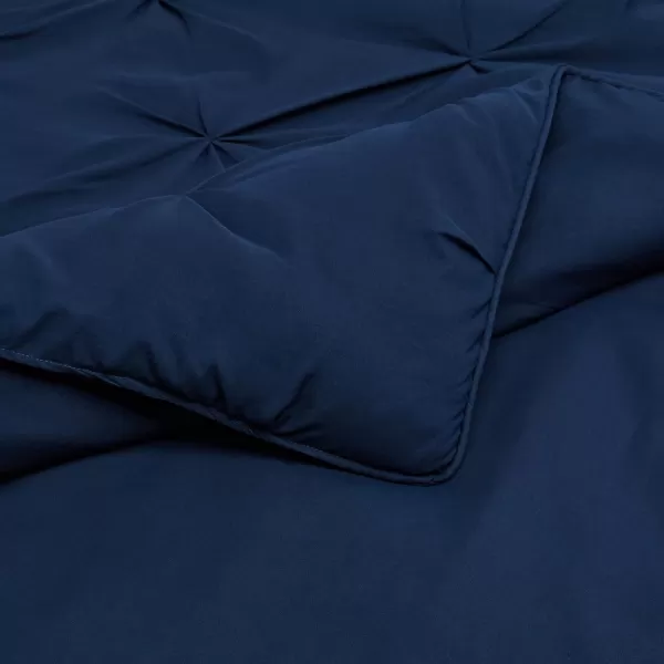 Amazon Basics AllSeason DownAlternative 3 Piece Comforter Bedding Set FullQueen Bright White PinchPleat With Piped EdgesNavy Blue King