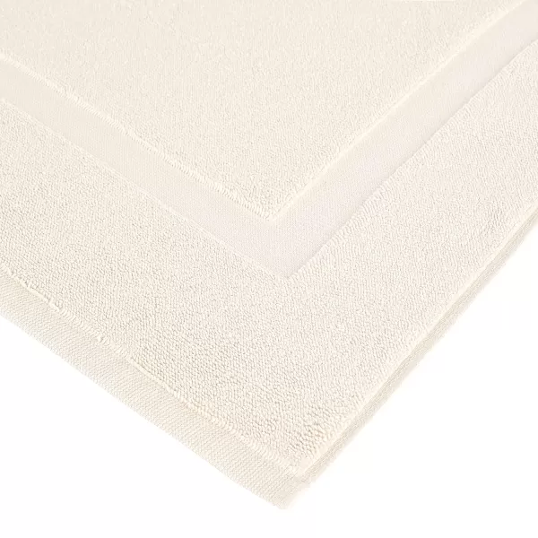 Amazon Basics Banded Bathroom Bath Rug Mat Bright White 31 L x 20 WCream 1Pack