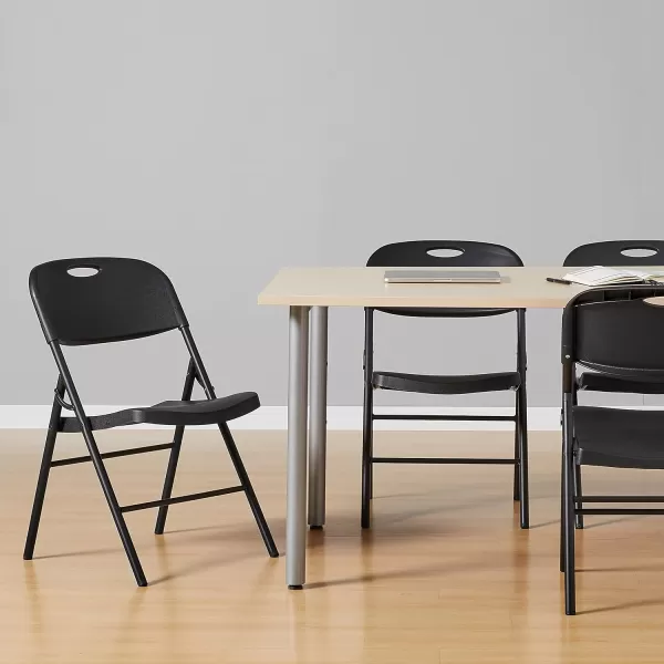 Amazon Basics Folding Plastic Chair 350Pound Capacity White 4Pack4Pack Black