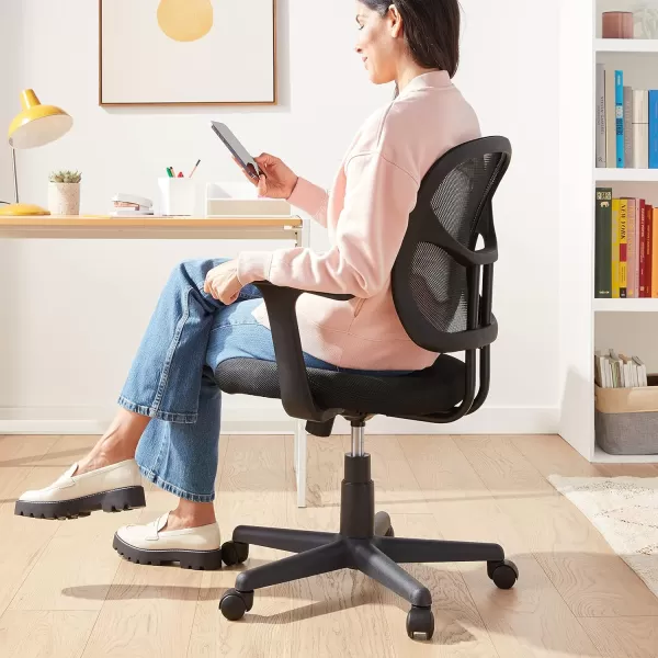 Amazon Basics Mesh MidBack AdjustableHeight 360Degree Swivel Office Desk Chair with Armrests BlackAmazon Basics Mesh MidBack AdjustableHeight 360Degree Swivel Office Desk Chair with Armrests Black