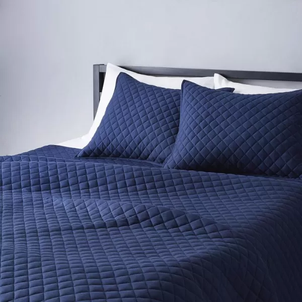 Amazon Basics Cotton Jersey 4Piece Bed Sheet Set King Oatmeal SolidNavy Blue King Quilt Set